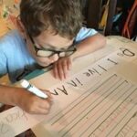 Image of child writing